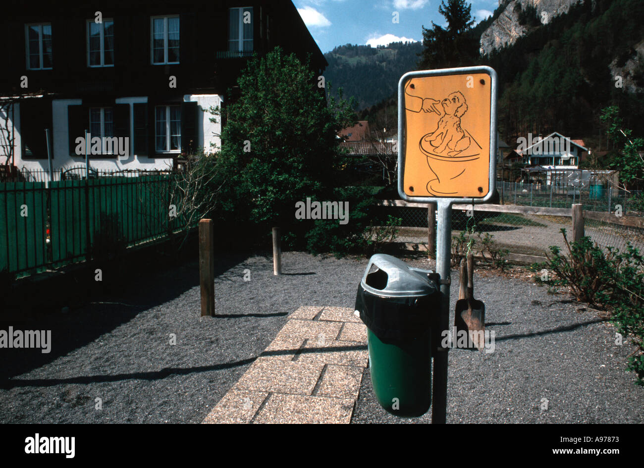 Public toilet for dogs in Interlaken Switzerland with small shovels and