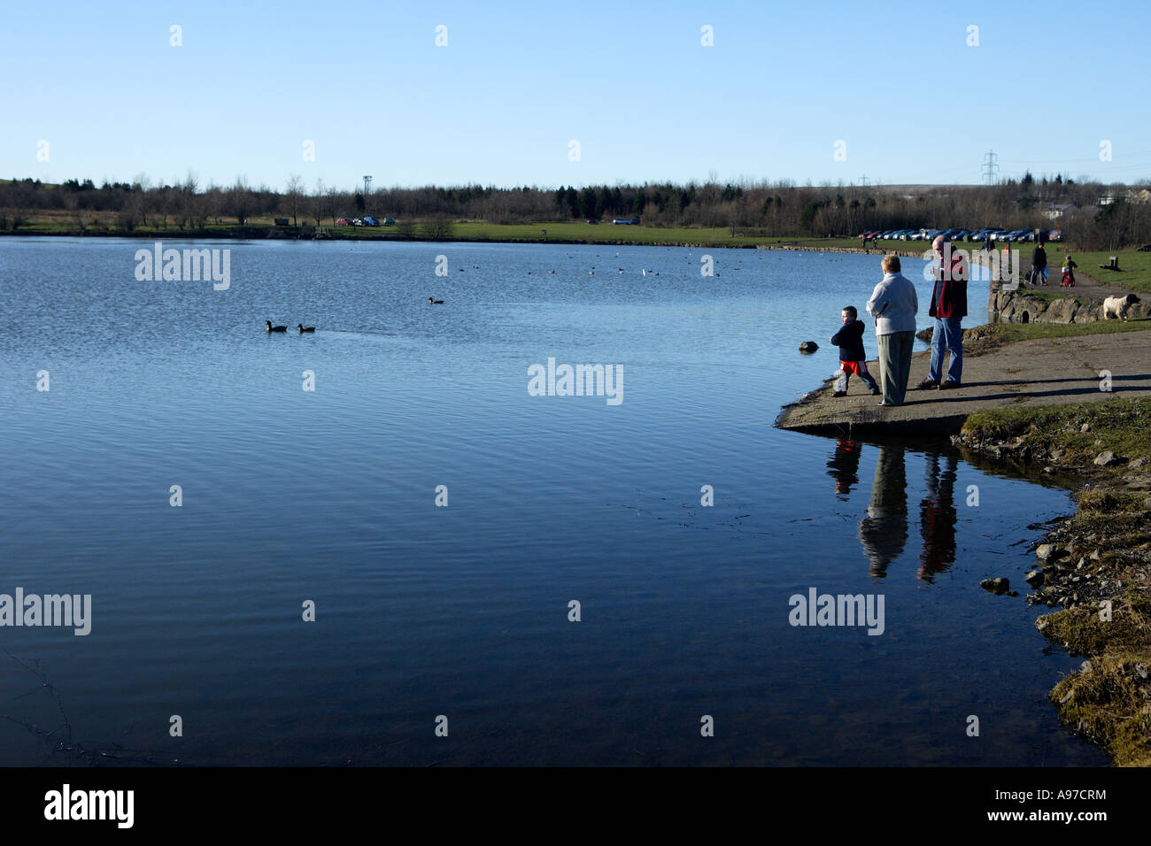 Visitors by Lakeside Bryn Bach Park Tredegar Stock Photo