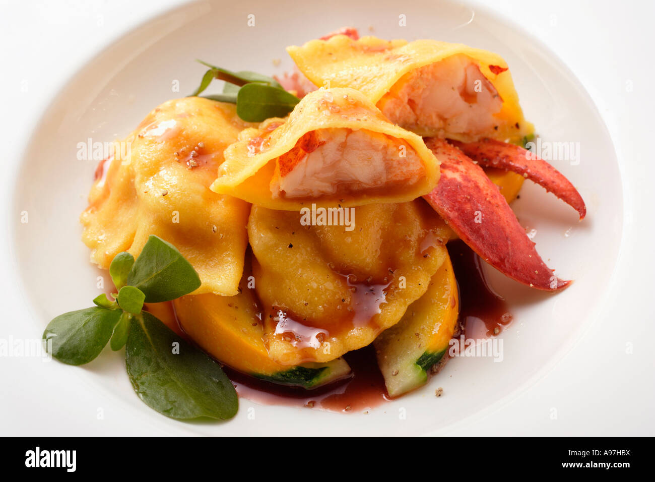 Ravioli with lobster filling on courgettes FoodCollection Stock Photo
