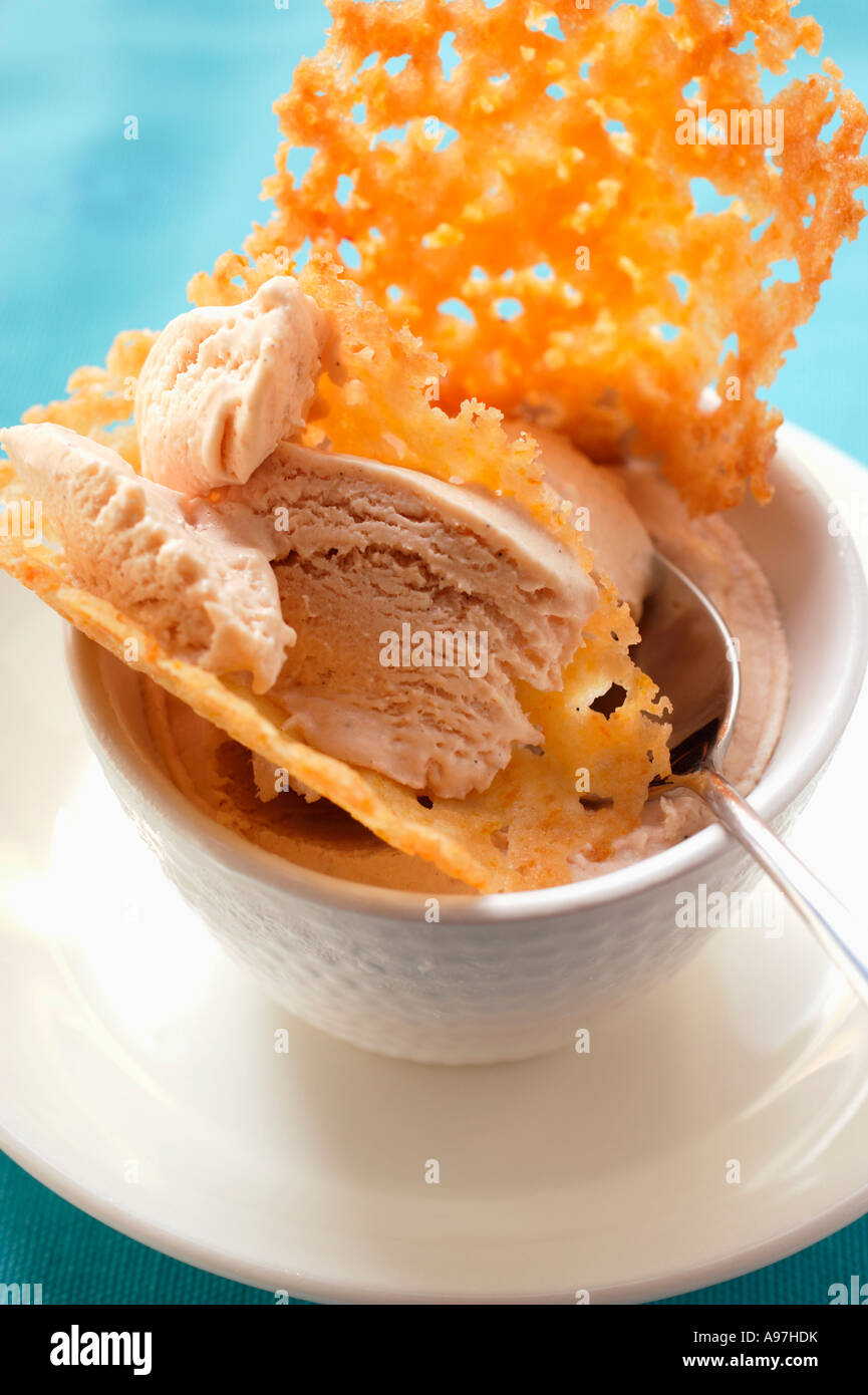 Rhubarb ice cream with wafers in white cup FoodCollection Stock Photo