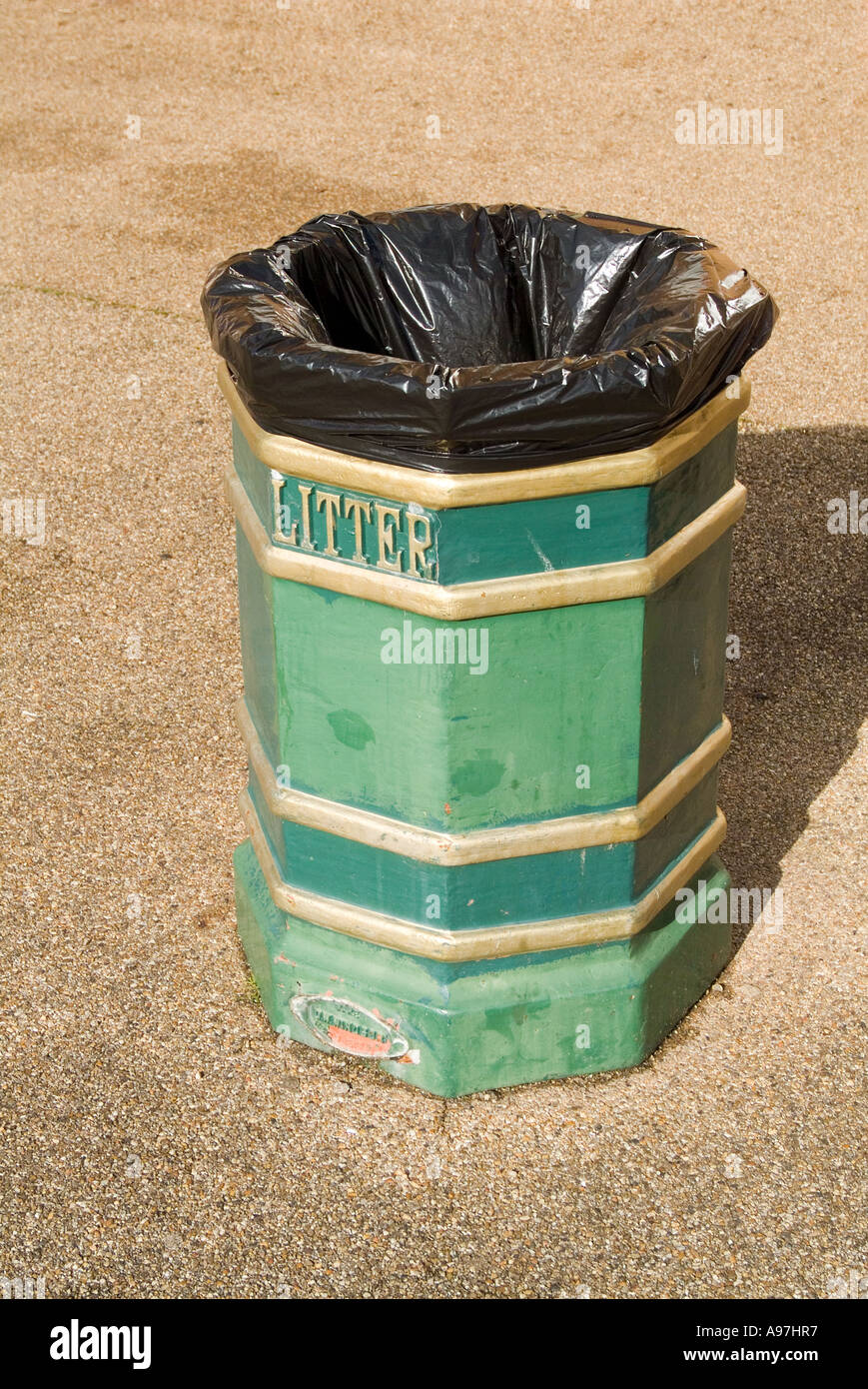 Green and Gold Litter Bin Stock Photo Alamy