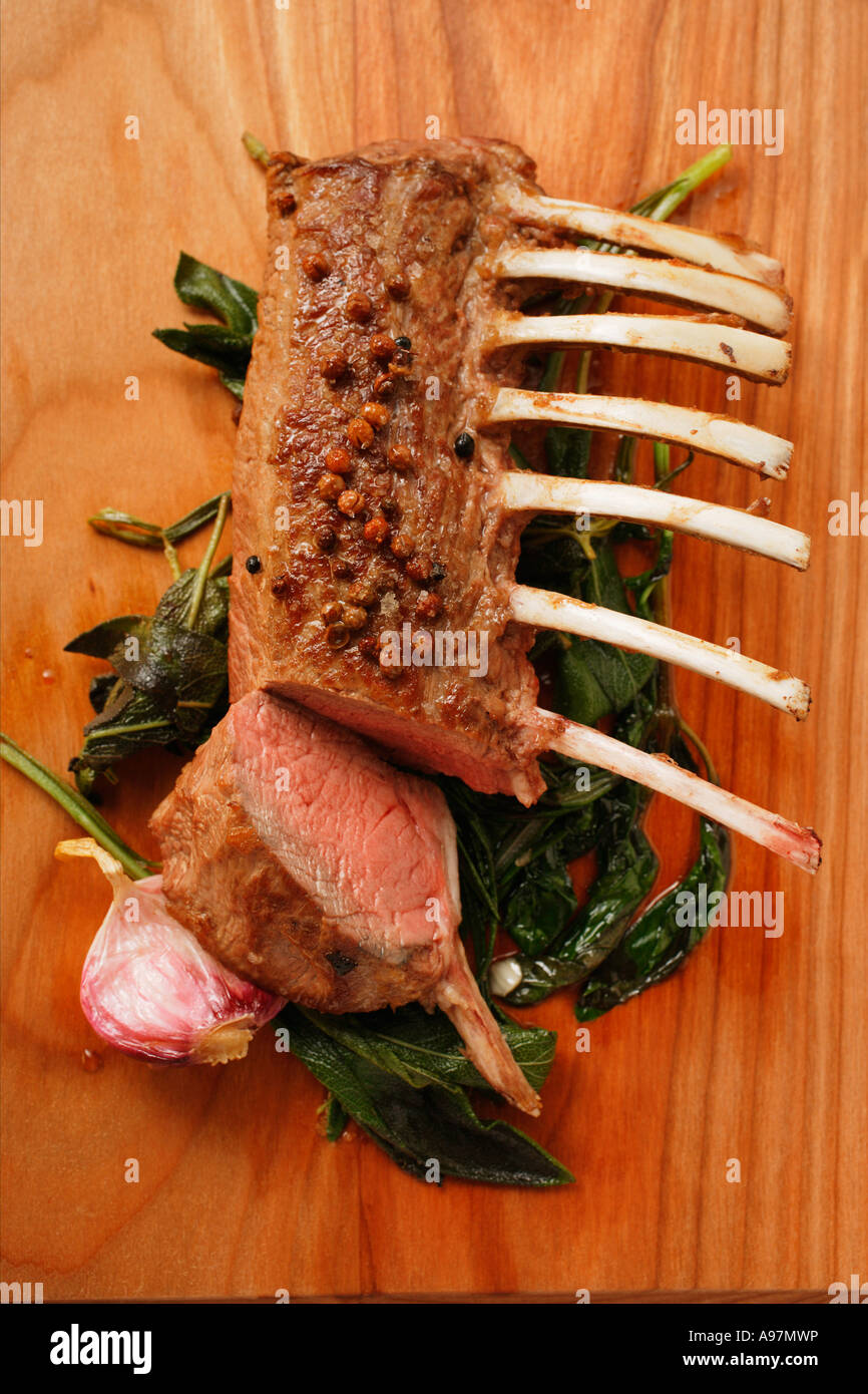 Rack of lamb with Sichuan pepper on fried sage FoodCollection Stock Photo