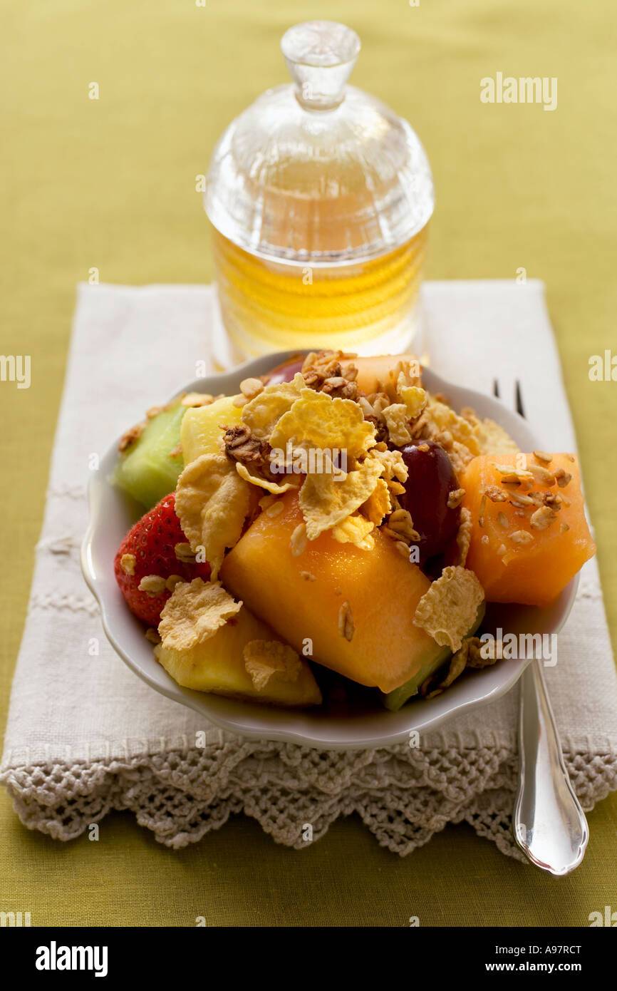 Muesli with mixed fruit cereal and honey FoodCollection Stock Photo Alamy