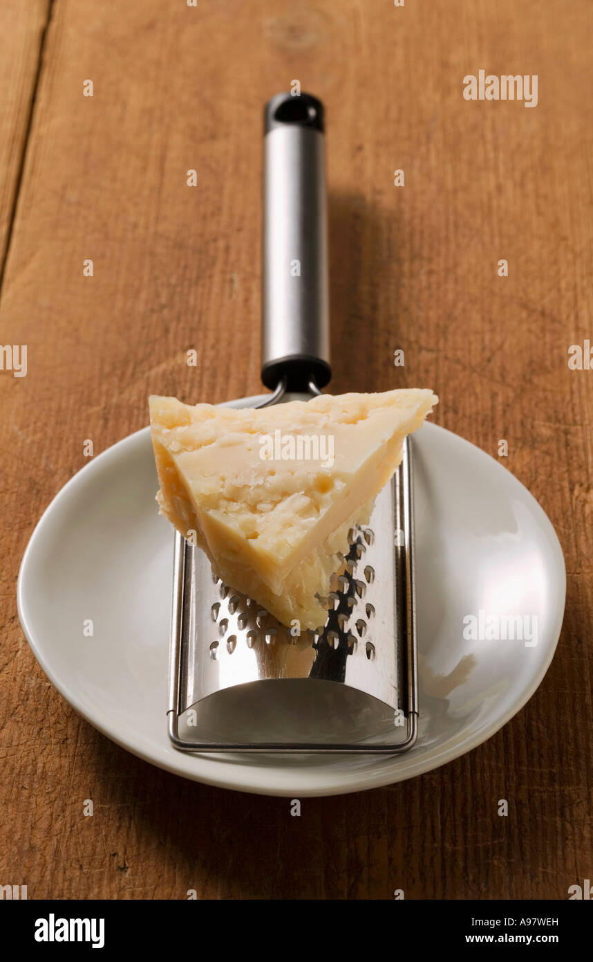 Piece of Pecorino with grater FoodCollection Stock Photo Alamy