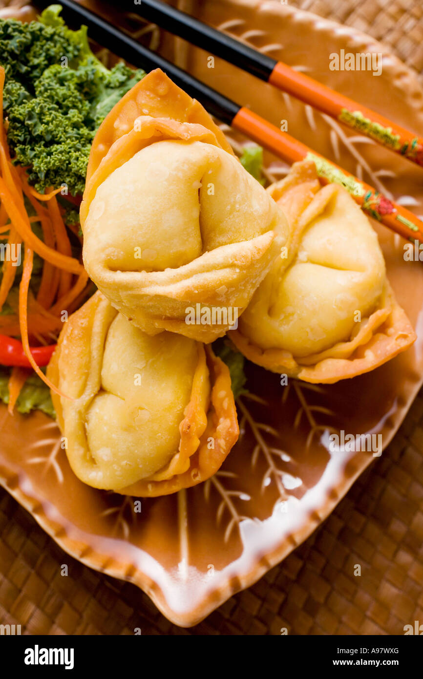 Deep fried wontons with salad FoodCollection Stock Photo Alamy