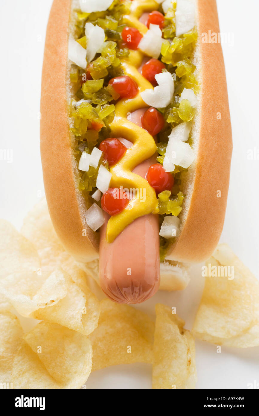 Hot Dog With Relish Mustard Ketchup Onions And Crisps Foodcollection Stock  Photo - Alamy