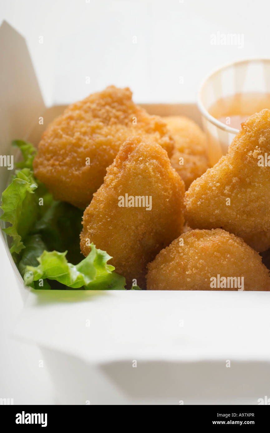 Chicken Nuggets with sweet and sour sauce to take away FoodCollection