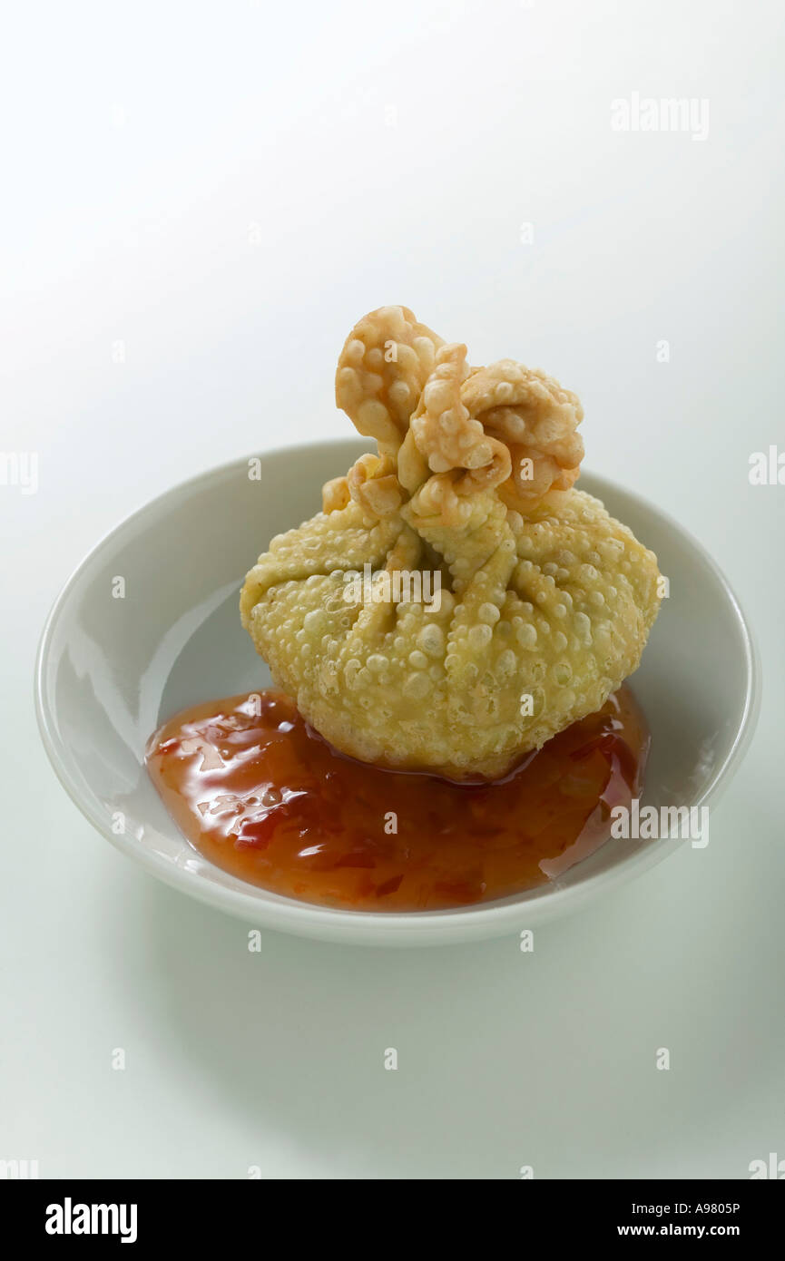 Deep fried wonton with chili sauce FoodCollection Stock Photo Alamy