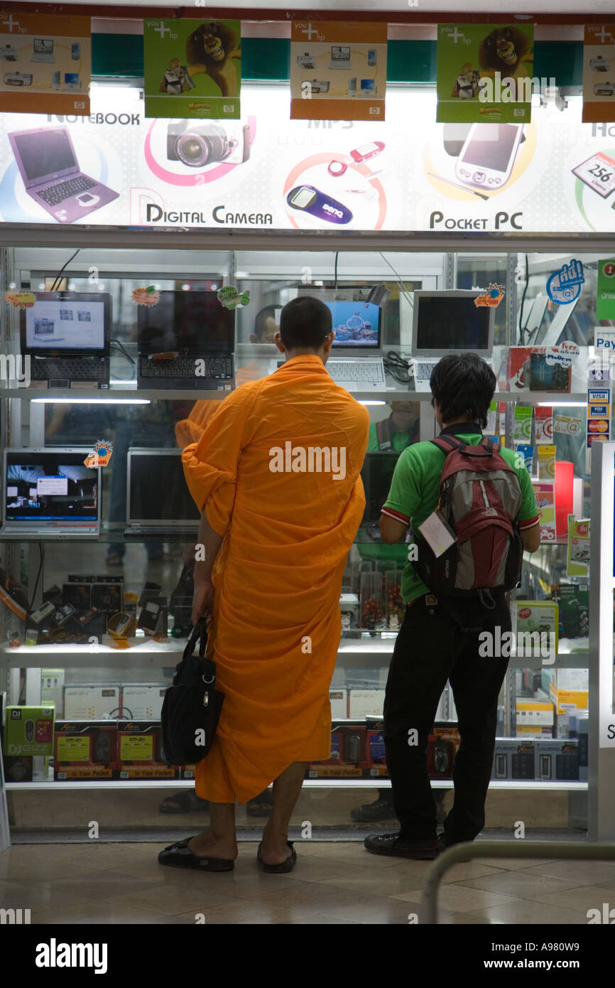 Buddhist monk shopping for computers, Bangkok, Thailand. Monks seem