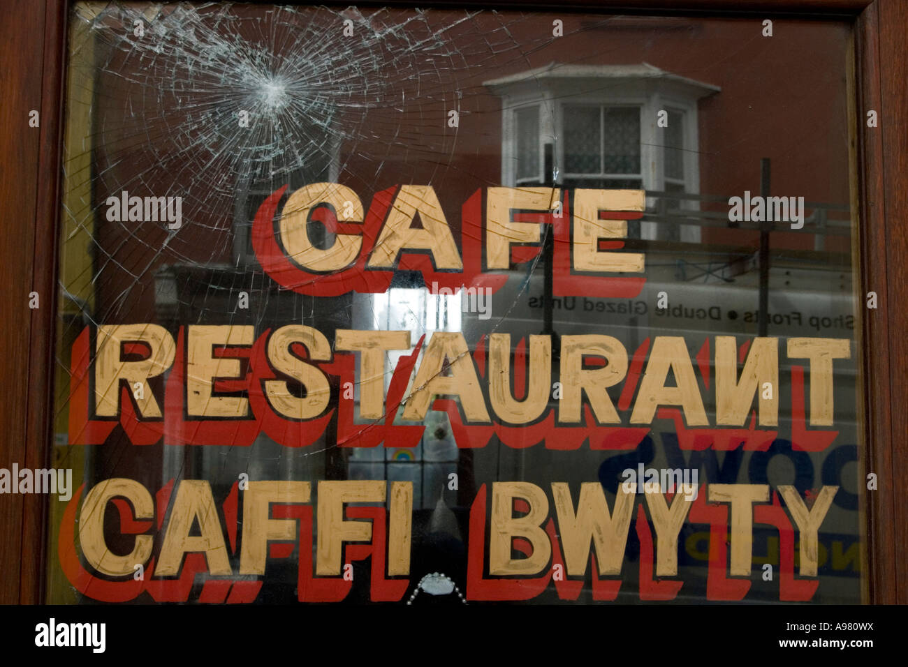 Crazed window of cafe, Aberystwyth, Wales. Stock Photo