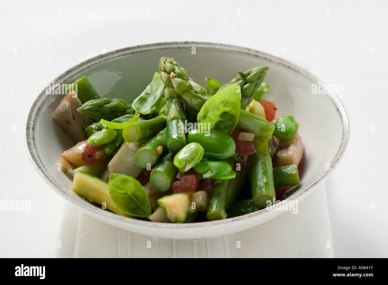 Green asparagus salad with beans and basil FoodCollection Stock Photo ...