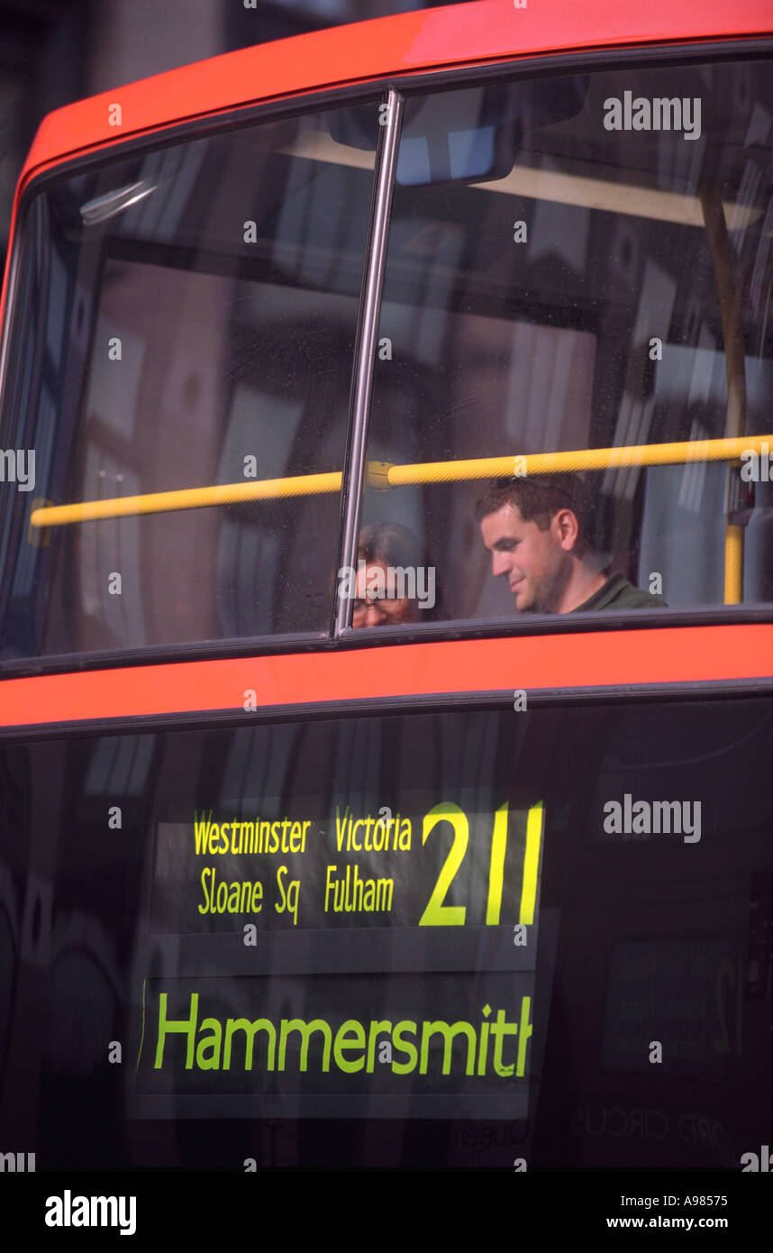 The front of a London bus showing passengers and displaying the destination Stock Photo