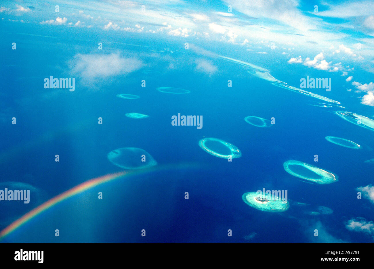 North Male atoll aerial view with rainbow Maldives Nick Hanna 2003 Stock Photo