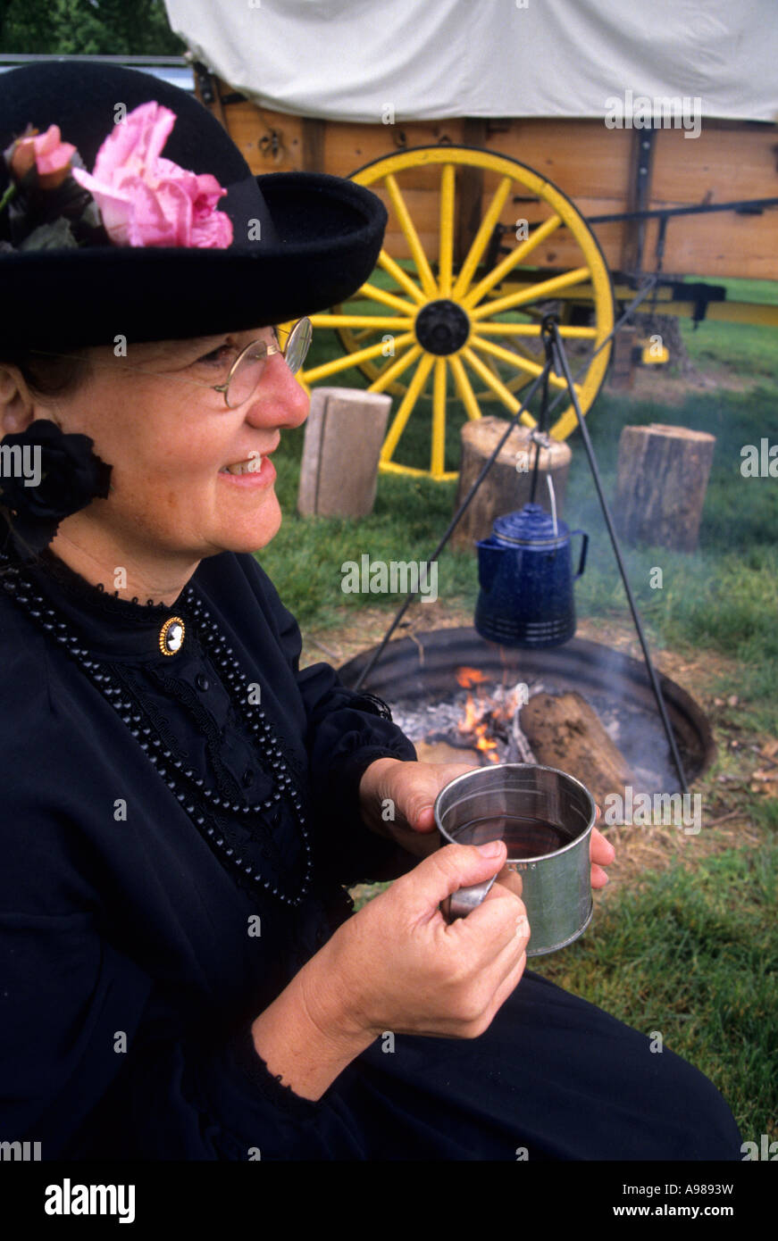 CAMPFIRE COFFEE AT RECONSTRUCTED FORT KEARNY (1848) STATE HISTORICAL PARK ALONG THE OREGON TRAIL, KEARNEY, NEBRASKA. SUMMER. Stock Photo