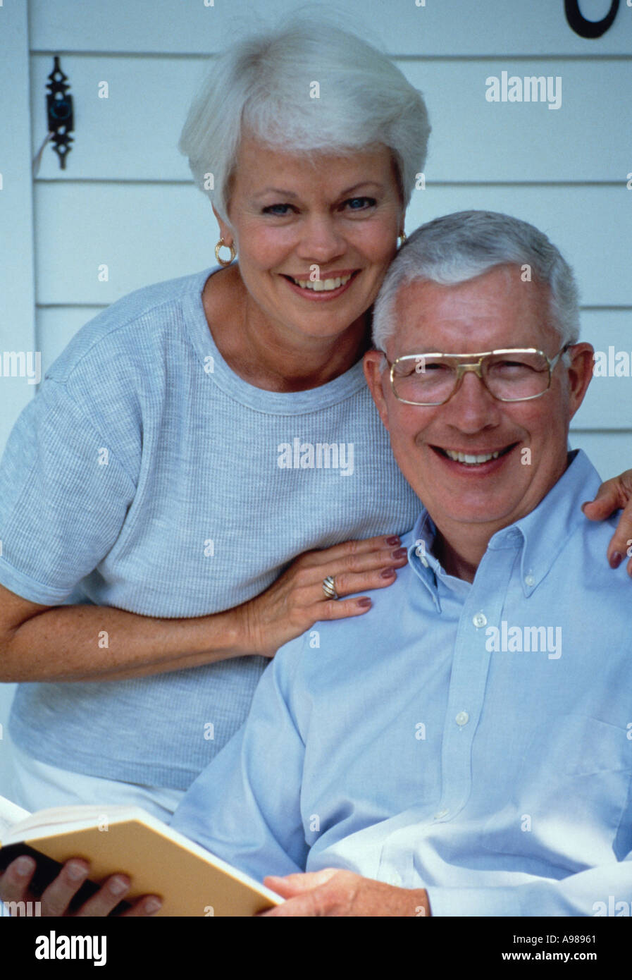 Older couple sitting on porch hi-res stock photography and images - Alamy