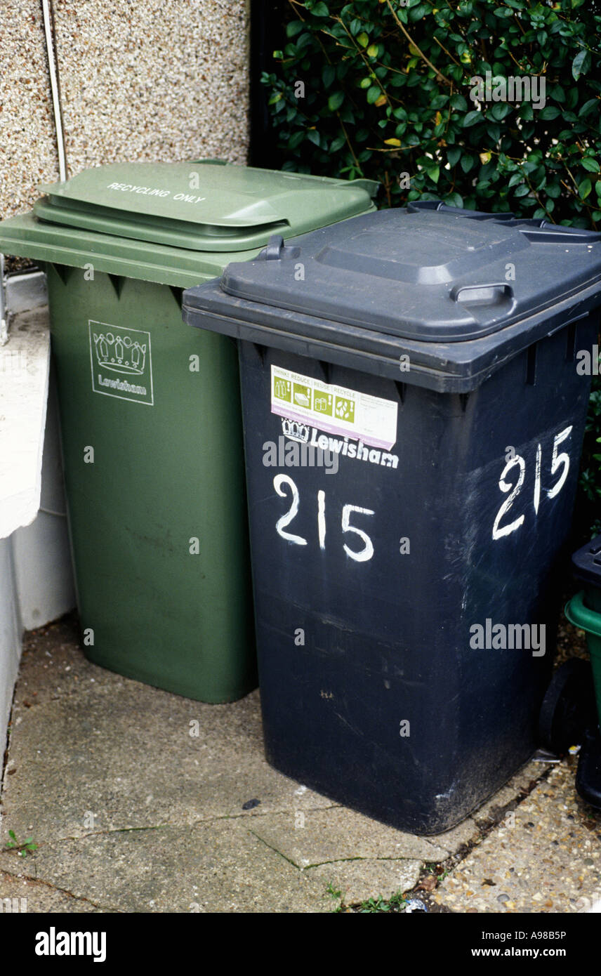 a green recycling wheelie bin saying 'recycling only' and a rubbish bin, Lewisham, London 2008