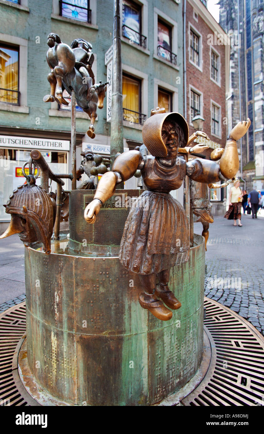 Puppenbrunnen fountain with statues in Aachen, Germany, Europe in the town centre Stock Photo