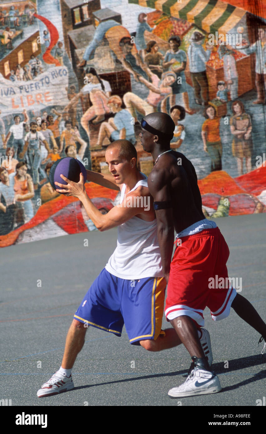 Two basketball players in action at New york city Stock Photo