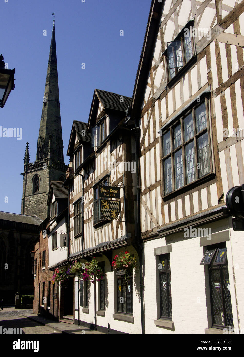Tudor Half Timbered Buildings in Butchers Row, and spire of St Alkmunds Church, Shrewsbury, Shropshire, England, UK, Stock Photo