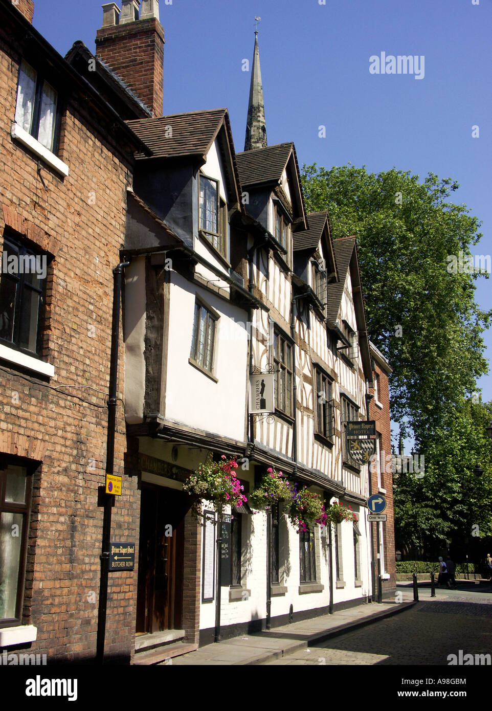 Tudor Half Timbered Buildings in Butchers Row, and spire of St Alkmunds Church, Shrewsbury, Shropshire, England, UK, Stock Photo