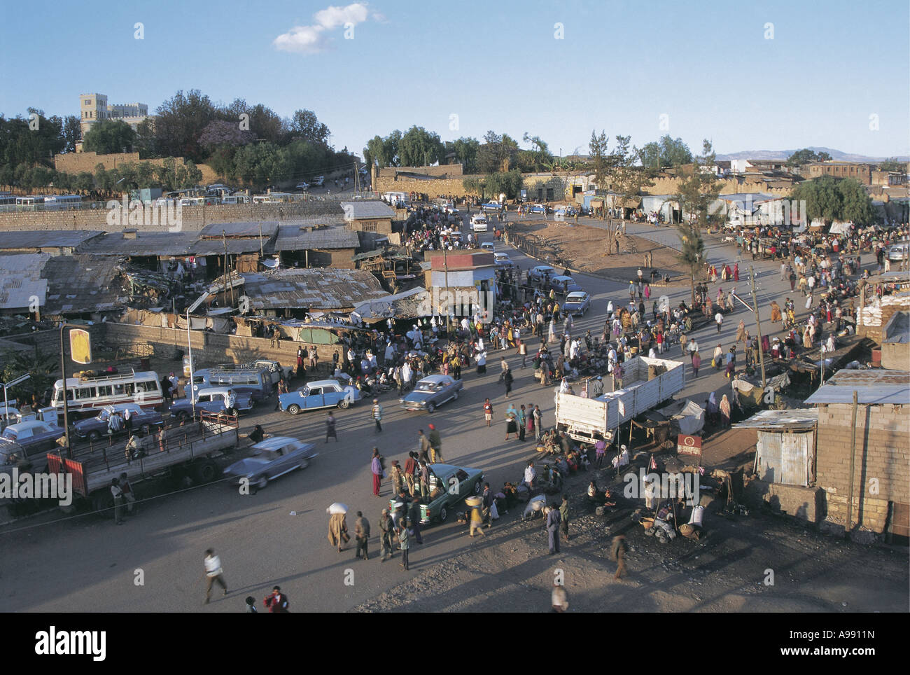 Busy market in Harer note old walls of city in background Ethiopia Stock Photo