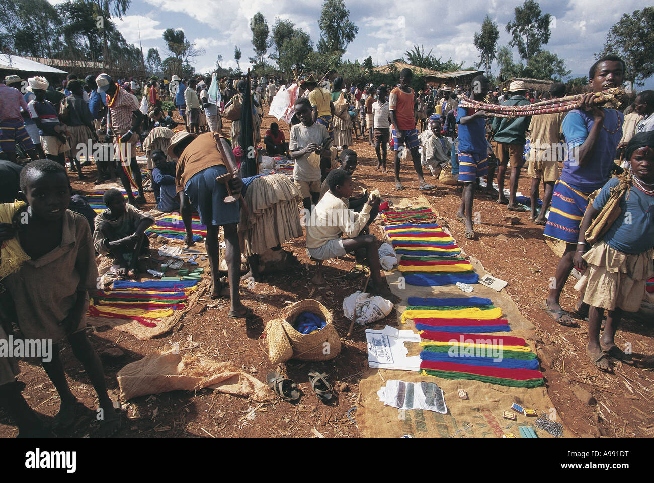 Busy market selling threads for traditional colourful clothes Konso ...
