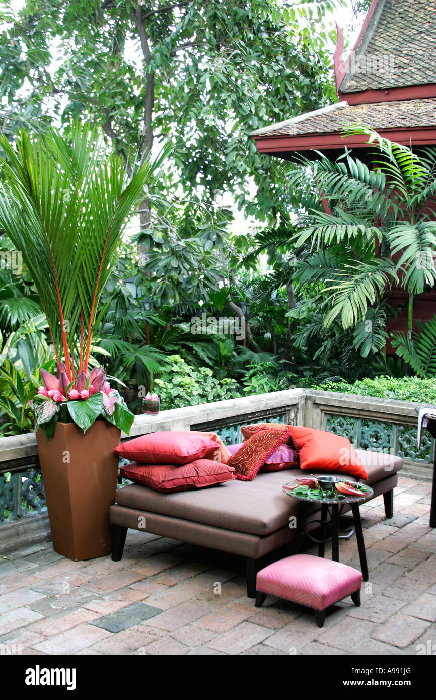 Floral Decor display on the terrace of Jim Thompson's house,shop and museum  in Bangkok,Thailand Stock Photo