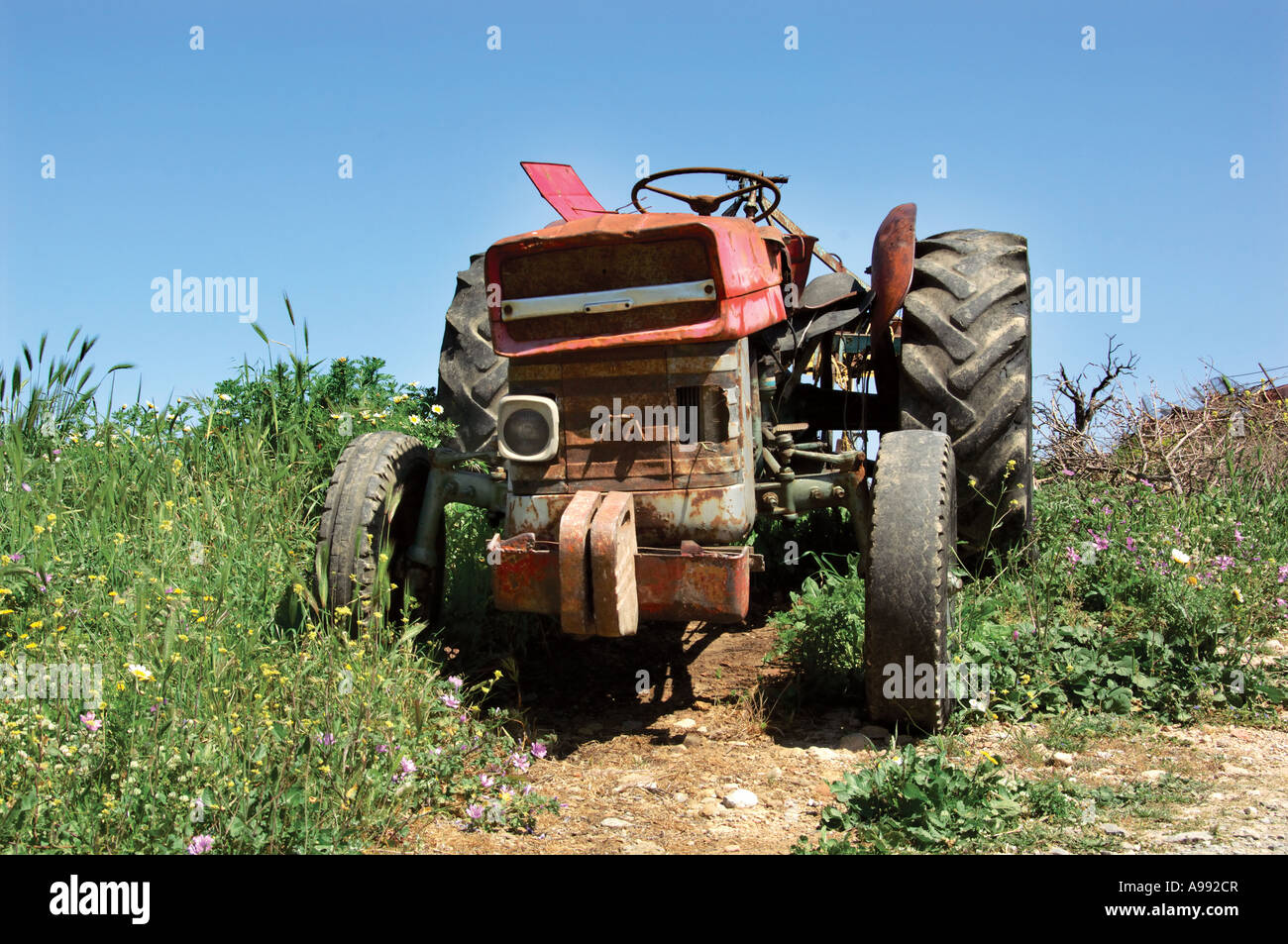 old disused agriculture tractor Crete Greece Stock Photo