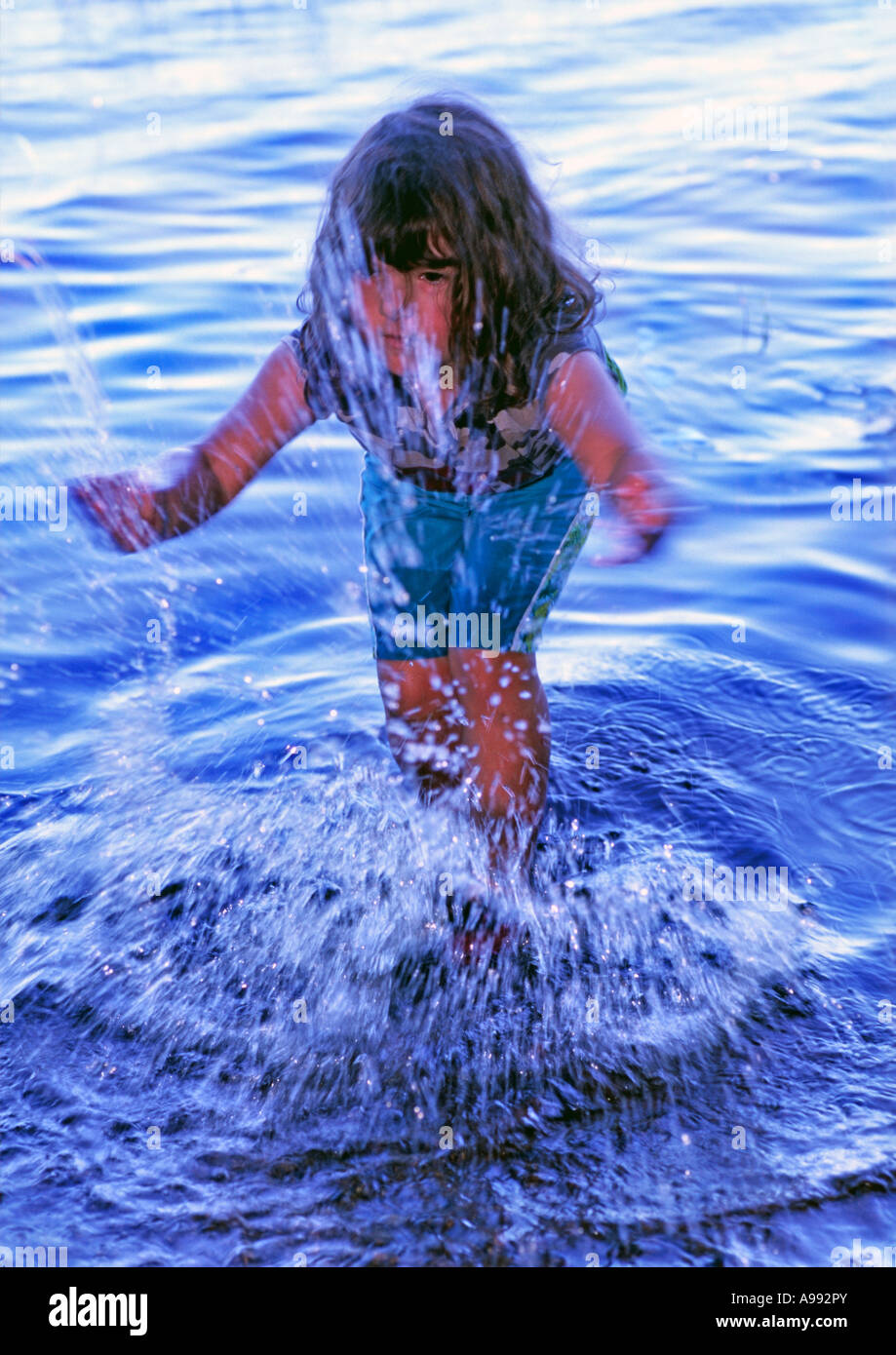 child splashing Stock Photo