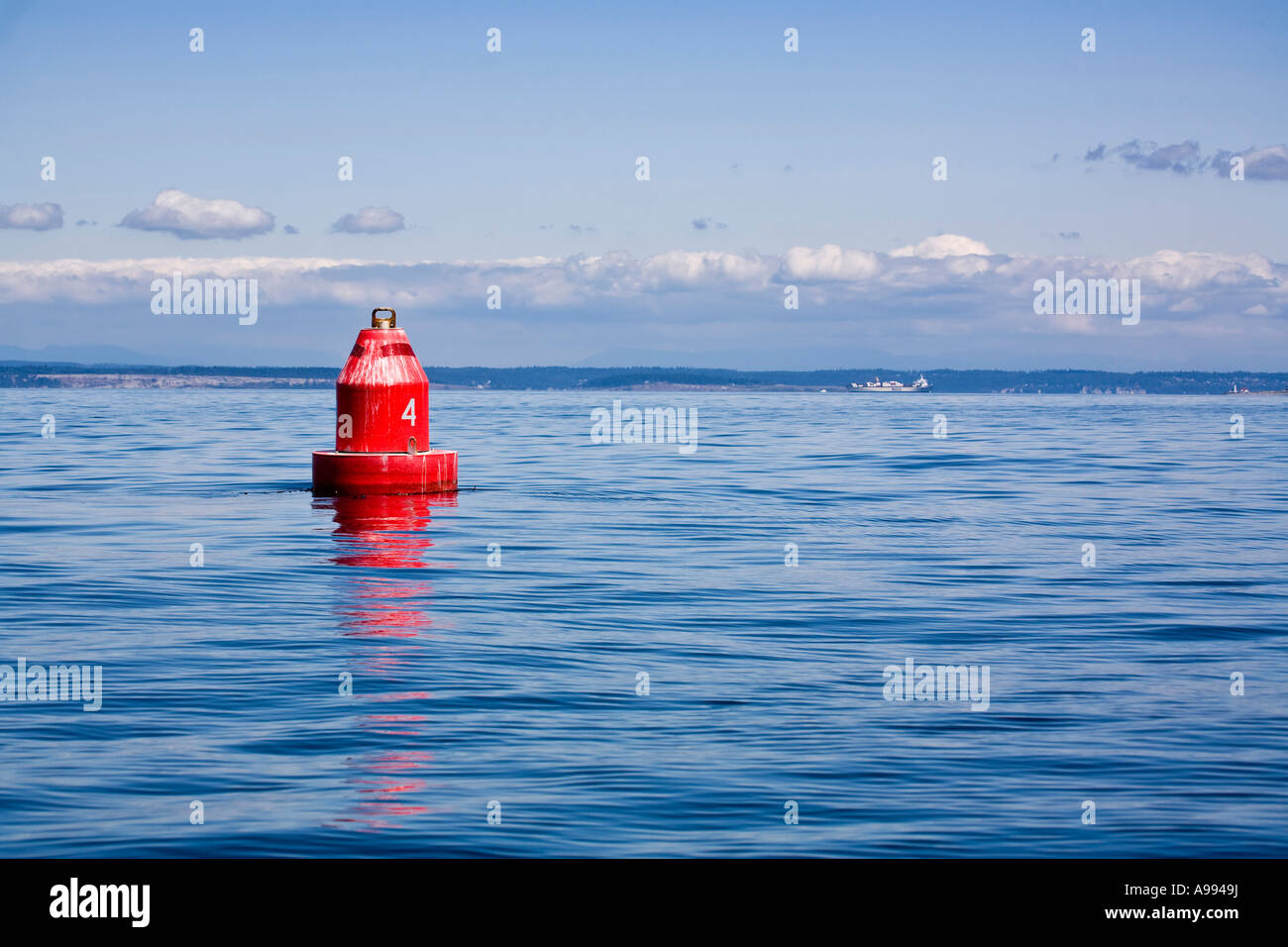 Red channel marker bouy marks right side of channel Puget Sound Whidbey