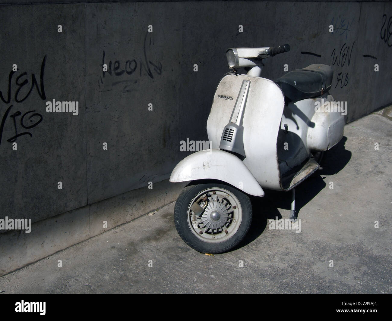 vespa with wheel lock Stock Photo Alamy