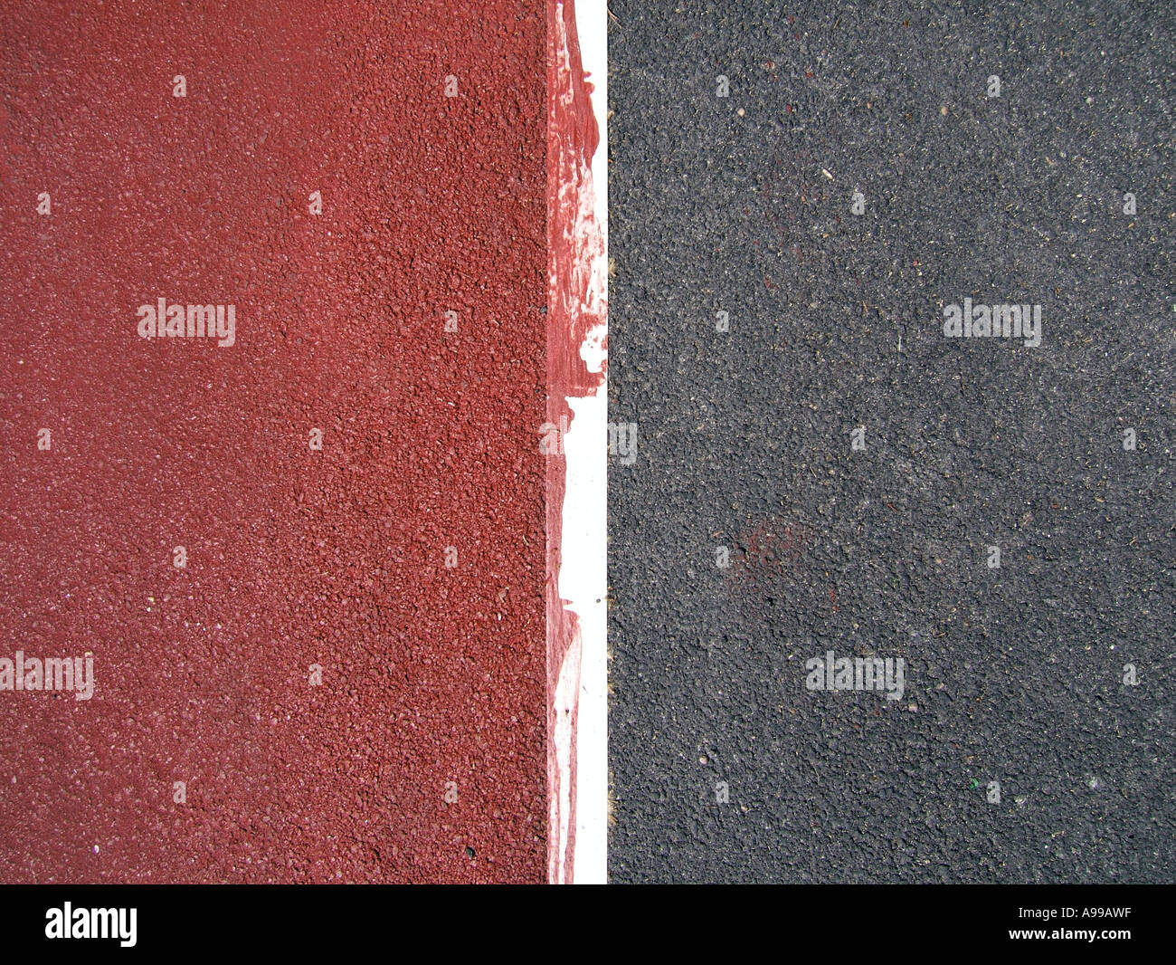 brown red paint on road cycle path construction Stock Photo Alamy