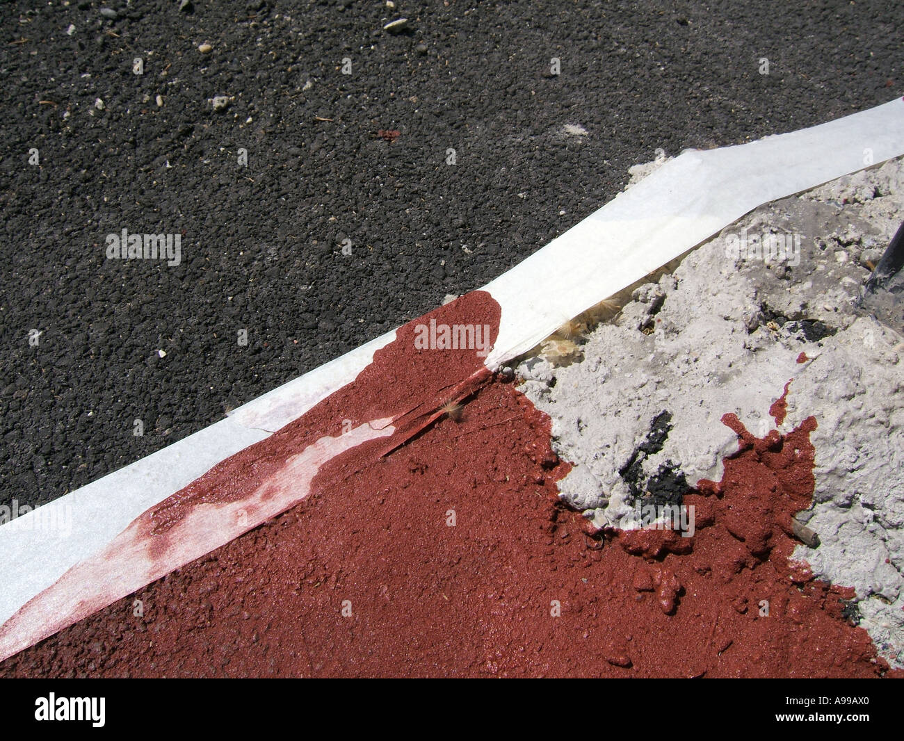 brown red paint on road cycle path construction Stock Photo Alamy
