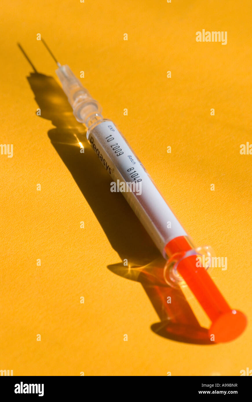 An hypodermic syringe of Interferon showing drug batch number and