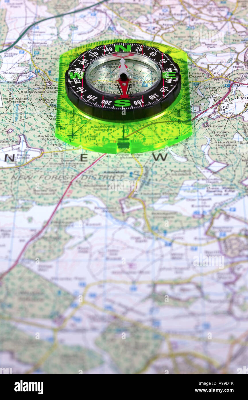 Compass on a map shallow DOF focus on compass Stock Photo