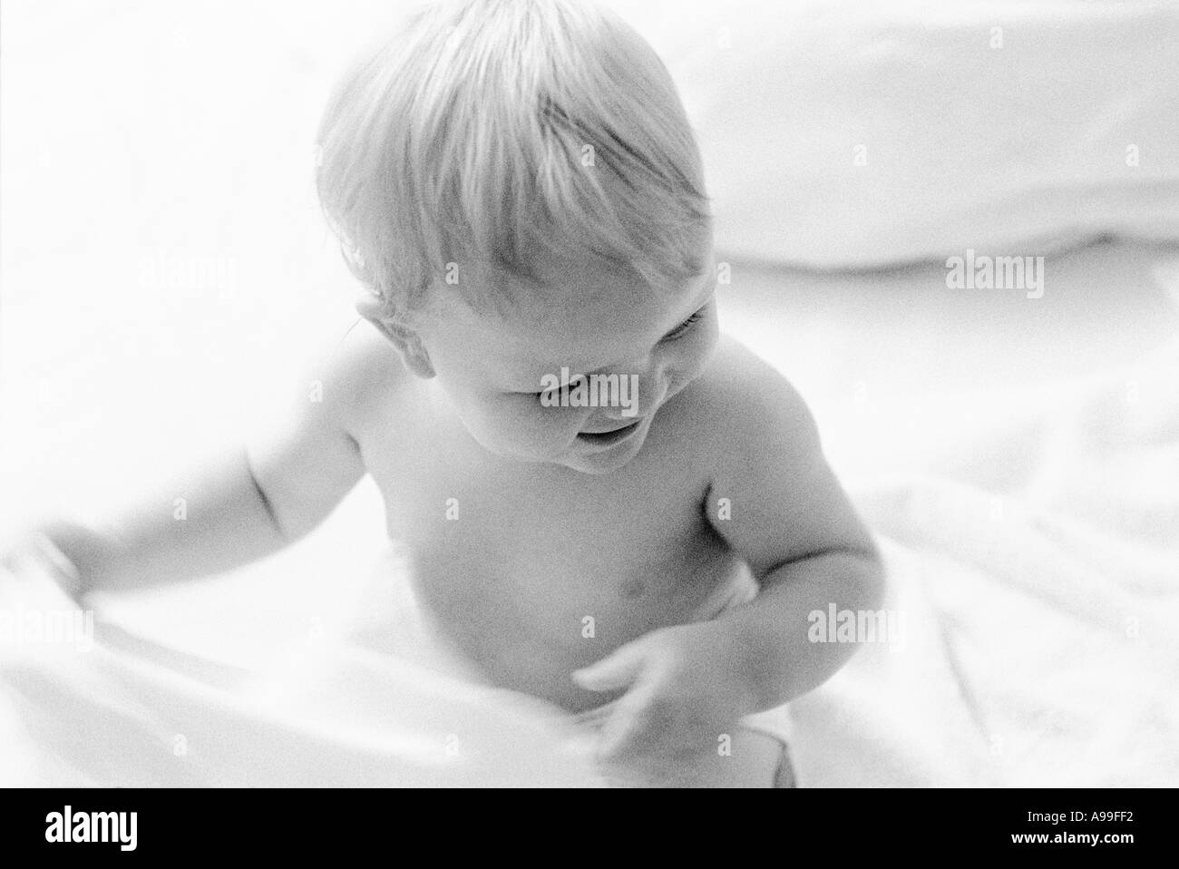black and white portrait of baby pulling blanket Stock Photo Alamy