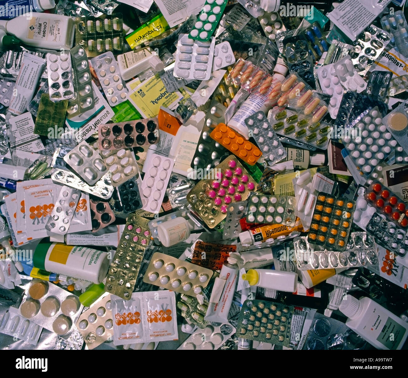 lots of used drugs pills in packages Stock Photo - Alamy