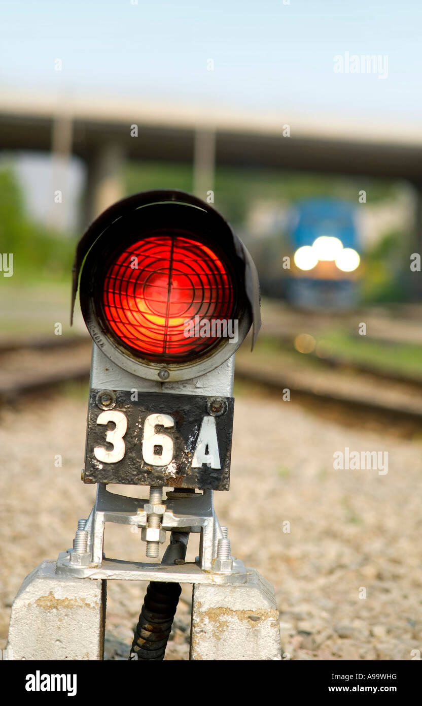 Red safety light beside train railway tracks Stock Photo - Alamy