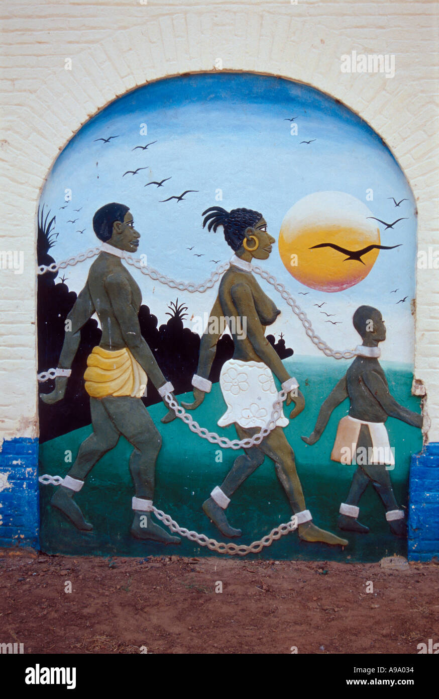 Mural on the wall of slave trade museum at Jufureh The Gambia West Africa Stock Photo