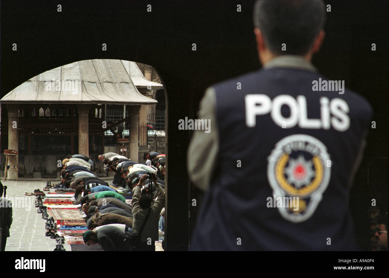 Diyarbakir, TURKEY -- Police wait to control any chaos that may occur during the anti war demonstration after Friday prayers Stock Photo