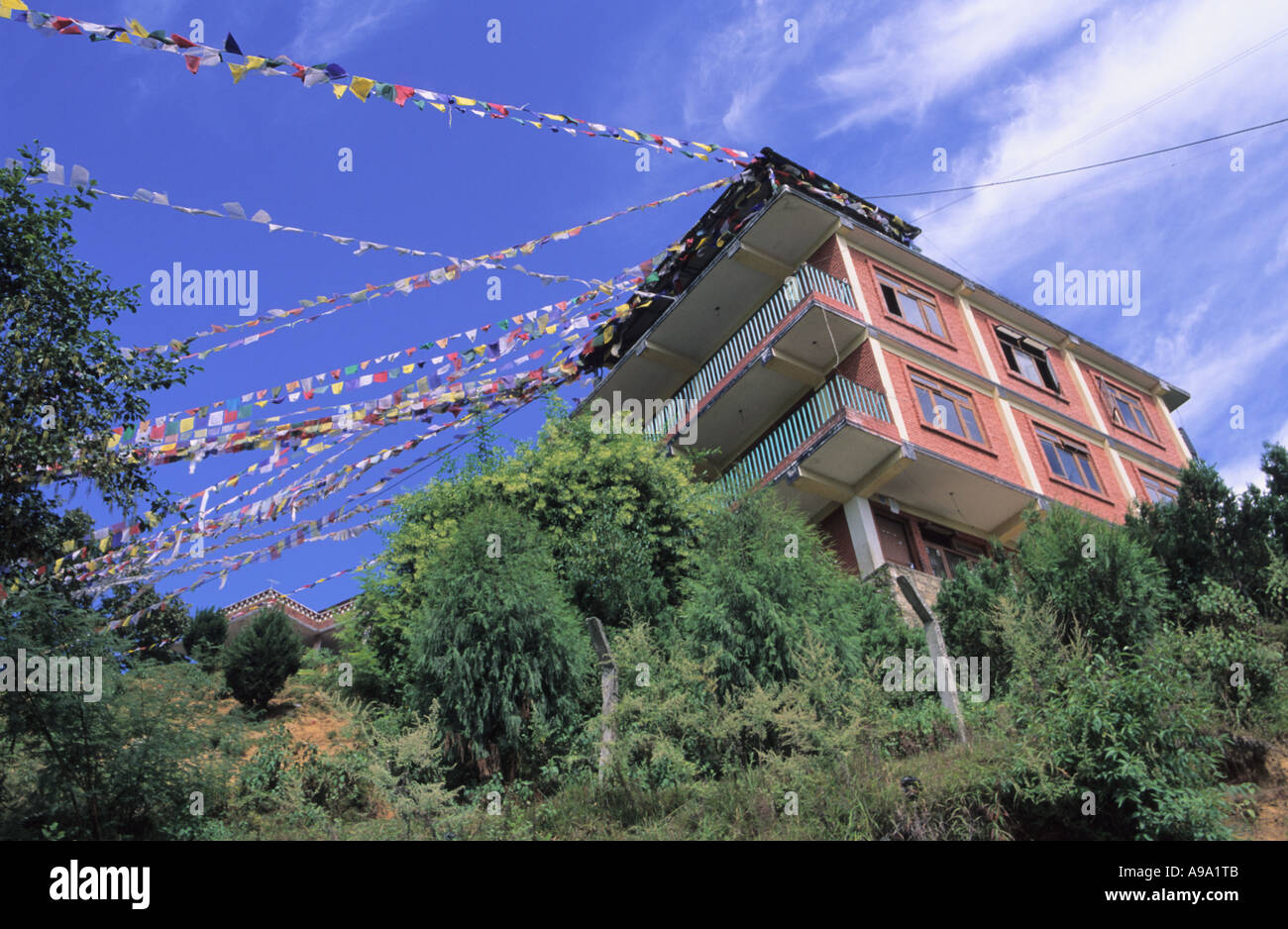 House and Prayer flags near Namo Buddha temple in Kathmandu valley ...