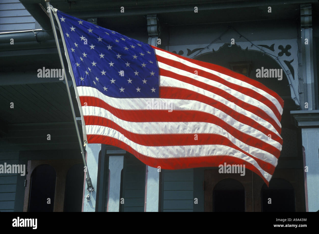 SINGLE UNITED STATES FLAG VICTORIAN HOME CAPE MAY NEW JERSEY USA Stock