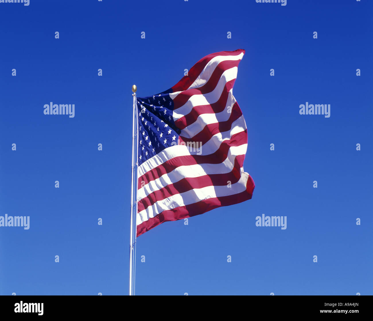 UNITED STATES FLAG BLUE SKY Stock Photo - Alamy