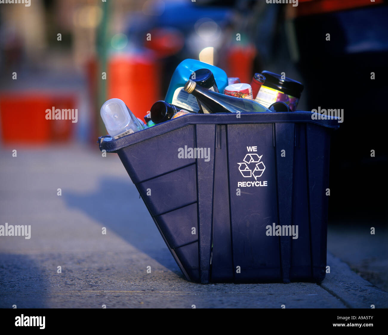 FULL RECYCLING BINS ON SIDEWALK PAVEMENT AWAITING COLLECTION Stock ...