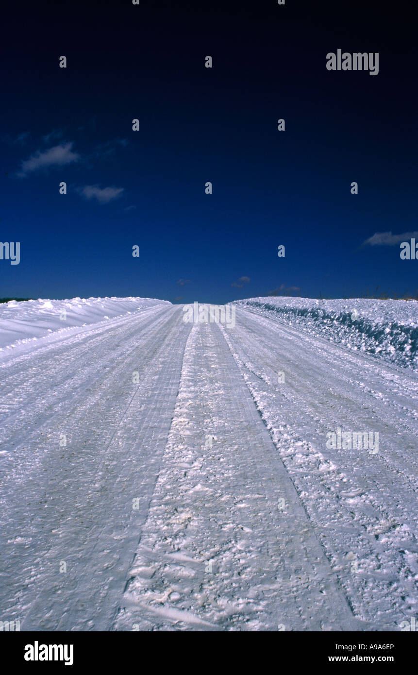 SNOW COVERED RURAL ROAD JEFFERSON COUNTY PENNSYLVANIA USA Stock Photo