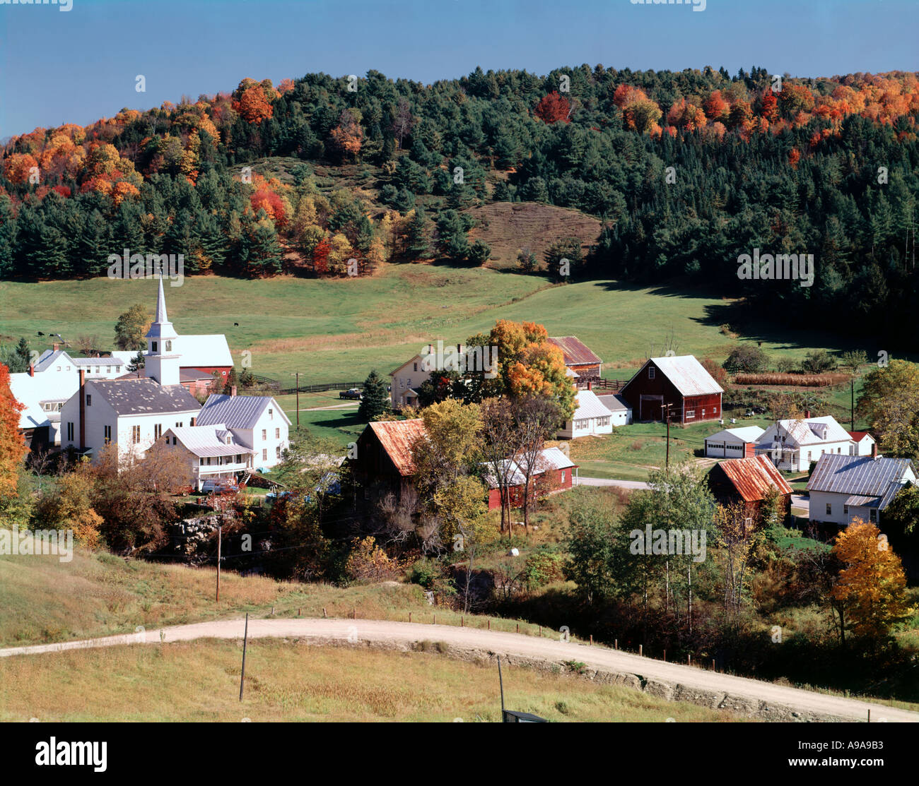 East Corinth Vermont with fall color in the background hillsides Stock Photo