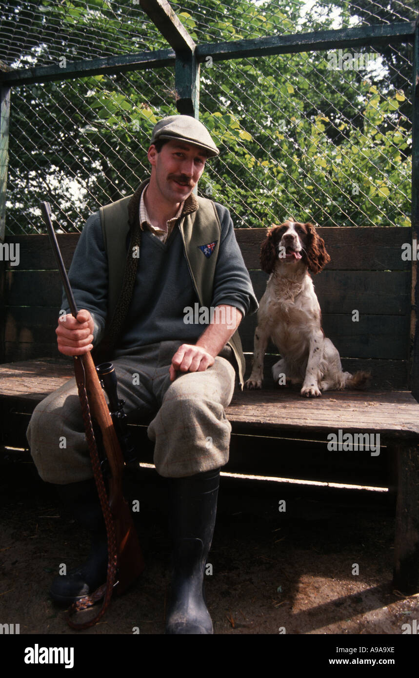 Scotland hunter dog rifle Stock Photo Alamy