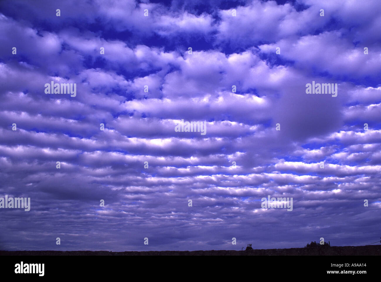 fluffy layered clouds www galleriesepifanoff com Stock Photo