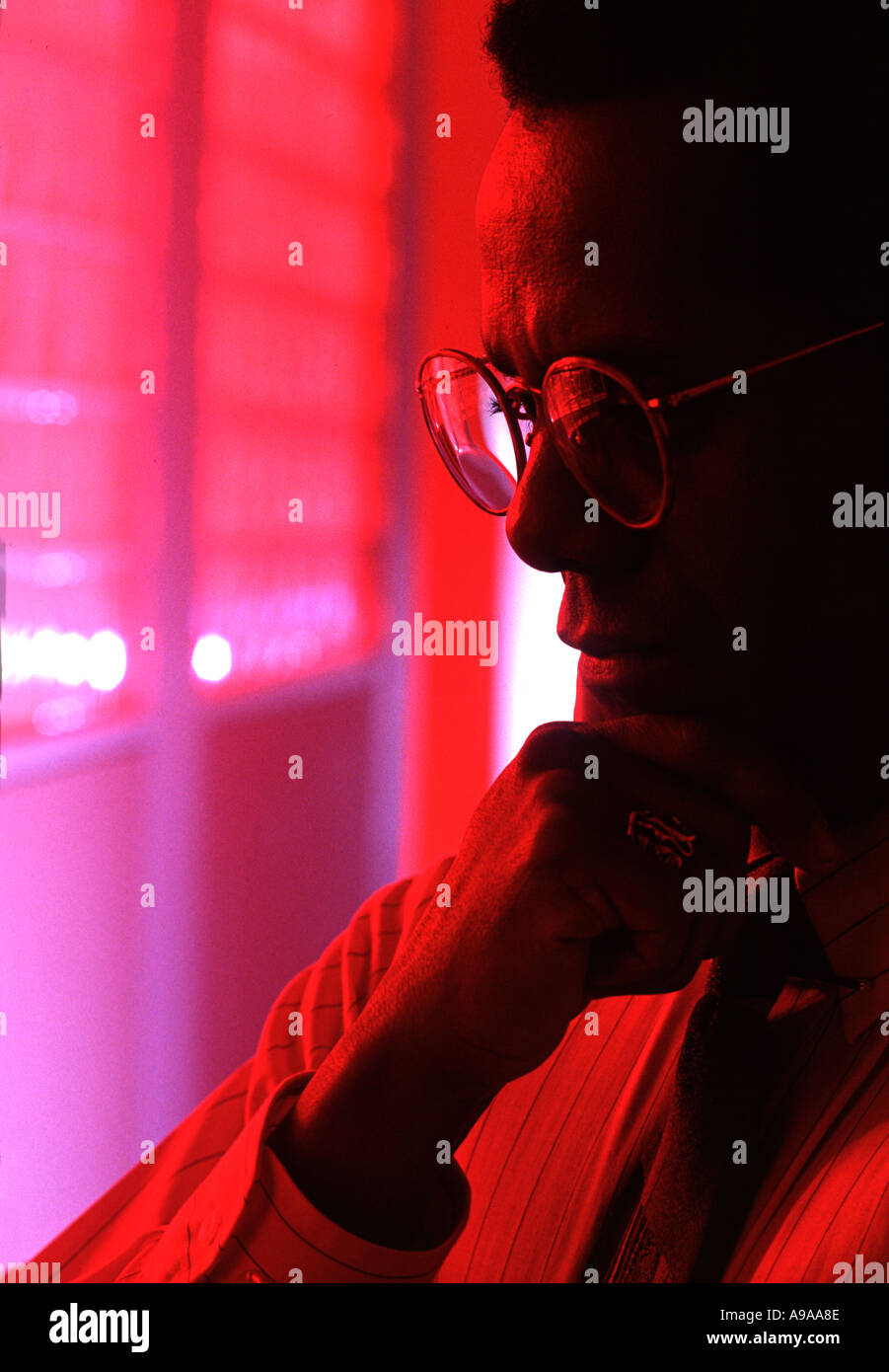 Research Scientist Pondering Problem in Laboratory Stock Photo