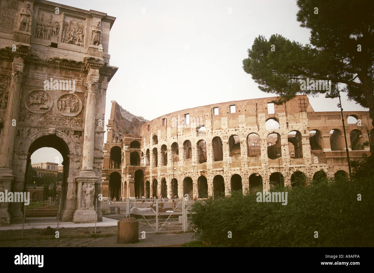 Collisseum in Rome and triumphal Arch of Constantine Stock Photo